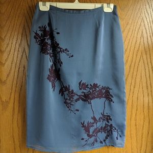 Express blue skirt with velvet purple leaf pattern